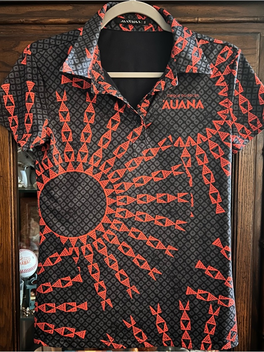 Manaola Cirque du Soleil AUANA Coral & Black Logo Polo
